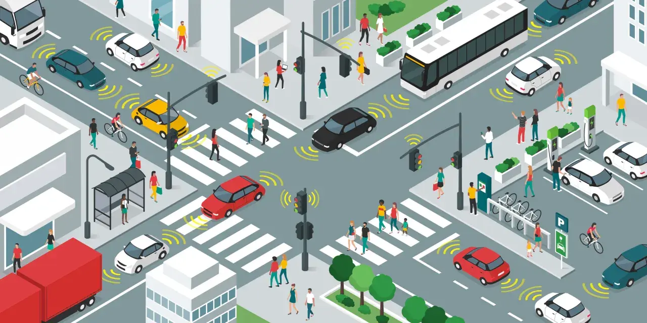 Scène urbaine animée illustrant l'analyse de la mobilité urbaine : voitures autonomes, bus, piétons, vélos et bornes de recharge.