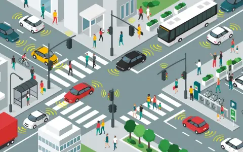 Scène urbaine animée illustrant l'analyse de la mobilité urbaine : voitures autonomes, bus, piétons, vélos et bornes de recharge.